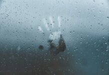 6 Tips to Help Manage Mild Memory Loss hand figure glass