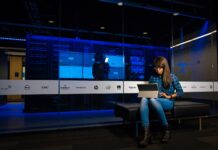 Seven Factors To Consider Before You Choose Web Hosting Company woman sitting on chair