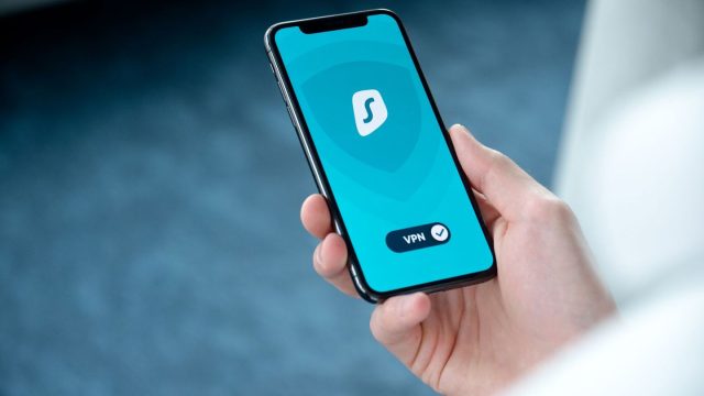 a-hand-holding-a-smartphone-displaying-a-vpn