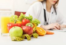 Career Options After B.Sc. Food, Nutrition & Dietetics A person sitting at a table with food Description automatically generated