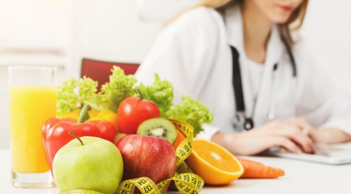 Career Options After B.Sc. Food, Nutrition & Dietetics A person sitting at a table with food Description automatically generated