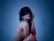 The Road To OnlyFans Fame: Biggest Challenges That Content Creators Face woman in red sleeveless dress