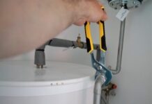 A Comprehensive Guide to Ball Valves and Float Valves: Essential Knowledge for DIY Enthusiasts person holding yellow and gray hand tool