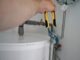 A Comprehensive Guide to Ball Valves and Float Valves: Essential Knowledge for DIY Enthusiasts person holding yellow and gray hand tool