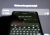 7 Simple AI Image Creation Tips Every Beginner Should Know Person typing on smartphone with ai chatbot on screen