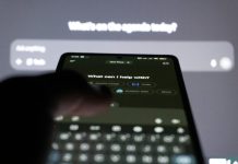7 Simple AI Image Creation Tips Every Beginner Should Know Person typing on smartphone with ai chatbot on screen