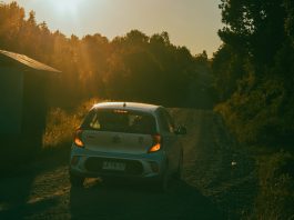 El Camino: The Soul’s Journey a white car driving down a dirt road