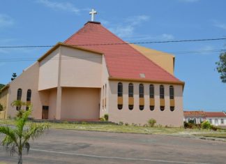 The Moral Dimensions of Choosing a Part-Time CFO for Your Parish or Nonprofit a church with a cross on top