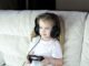 2024 Review Of Salfeld Child Control: Watching Over Kids While On The Internet a little girl sitting on a couch with headphones on