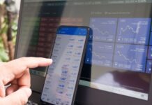 How do the forex trading markets work? black android smartphone turned on screen