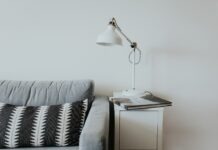 Is a full sofa sleeper useful? white desk lamp near gray fabric couch