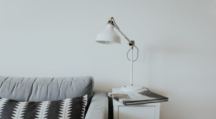 Is a full sofa sleeper useful? white desk lamp near gray fabric couch