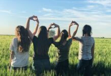 The Power of Peer Support: Building Connections for Teen Mental Health women forming heart gestures during daytime