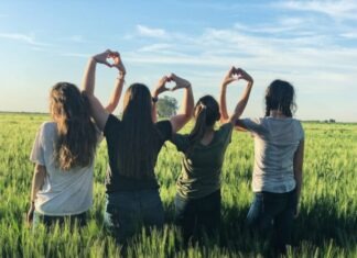The Power of Peer Support: Building Connections for Teen Mental Health women forming heart gestures during daytime