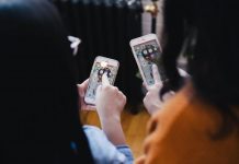 5 Mobile App Technology Trends to Expect in 2020 two women operating smartphone