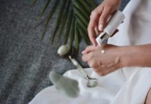 Turning Back the Clock With SNAP-8 person holding white plastic bottle pouring white liquid on white ceramic mug