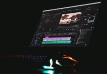 7 Ways to Create Professional Videos Without Hiring an Expensive Editor A computer monitor displaying video editing software with a timeline and preview window