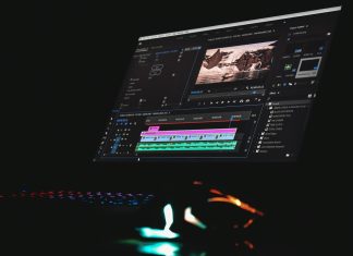 7 Ways to Create Professional Videos Without Hiring an Expensive Editor A computer monitor displaying video editing software with a timeline and preview window