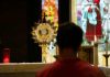The Significance of Catholic Holidays in the Lives of Believers a man standing in front of a church alter