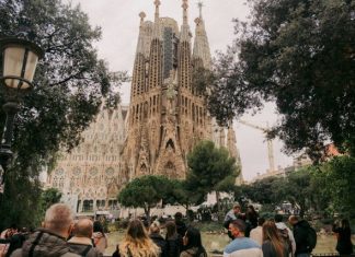 The Most Beautiful Christian Churches in Europe a crowd of people walking in front of a castle