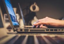 Simplifying Interstate Registration: The IRP Advantage person using silver laptop computer on desk