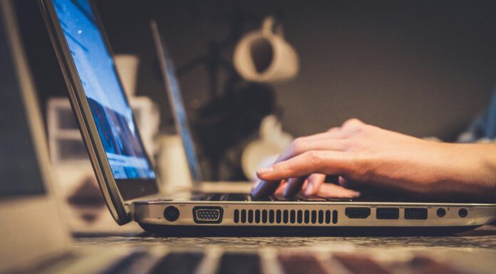 Simplifying Interstate Registration: The IRP Advantage person using silver laptop computer on desk