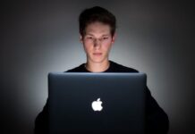 Mobile Gambling: 8 Best Practices to Consider When Setting Up an Online Casino man using laptop