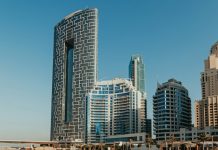 A Complete Guide to Finding Luxury Apartments for Rent in Dubai Marina A group of tall buildings next to a body of water
