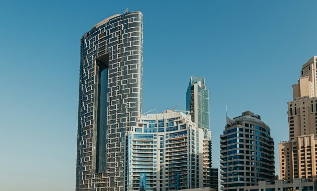 A Complete Guide to Finding Luxury Apartments for Rent in Dubai Marina A group of tall buildings next to a body of water