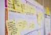 Best Project Management Tools for Your business to Flourish printed sticky notes glued on board