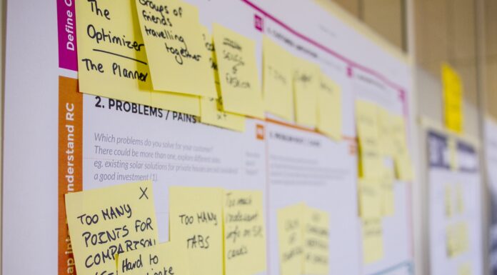 Best Project Management Tools for Your business to Flourish printed sticky notes glued on board